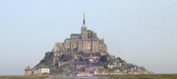 Mont Saint-Michel: Sheep graze on the reclaimed pr�-sal� or "salt meadow" (2004).